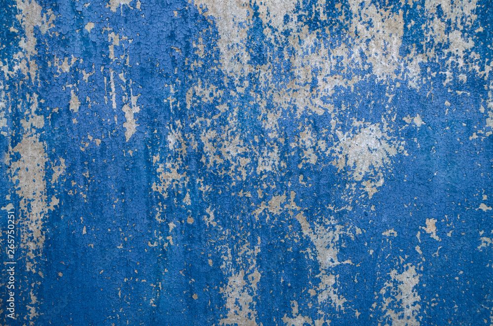 Fototapeta premium background of the old wooden wall with cracked, shabby, shabby blue paint.
