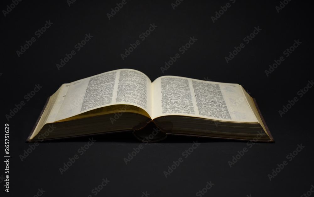 Obraz premium Open Book on black background