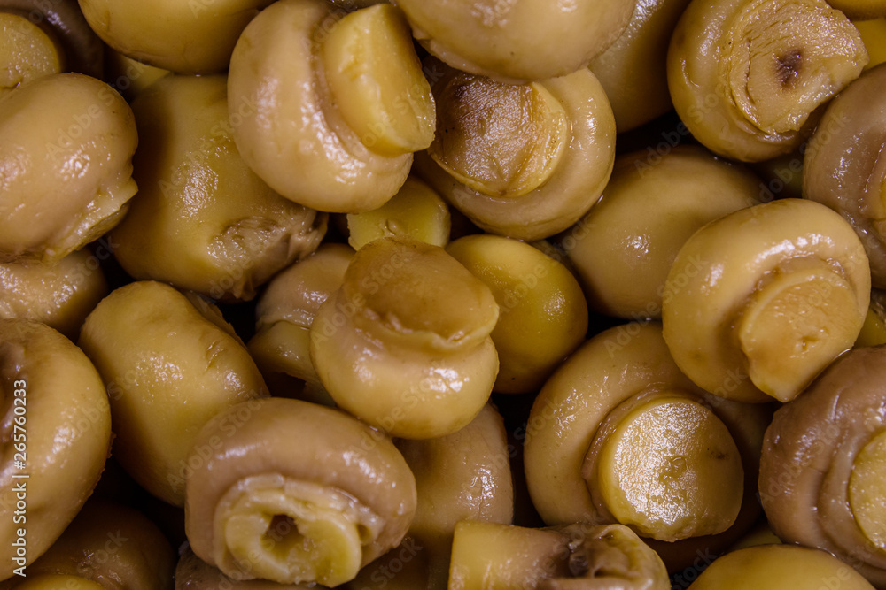 Texture of the canned mushrooms for the background Texture of the canned mushrooms for the background