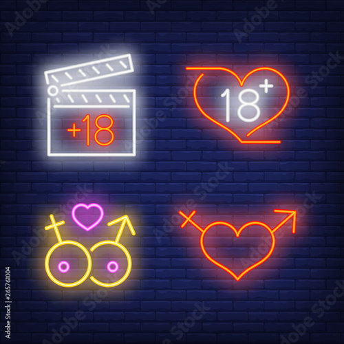 Eighteen on movie clapper board, hearts and gender neon signs