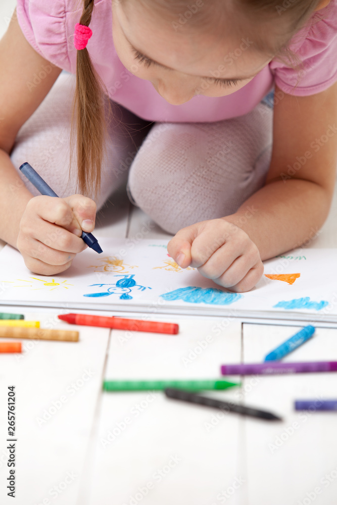 the girl draws with crayons in the album the girl draws with crayons in the album