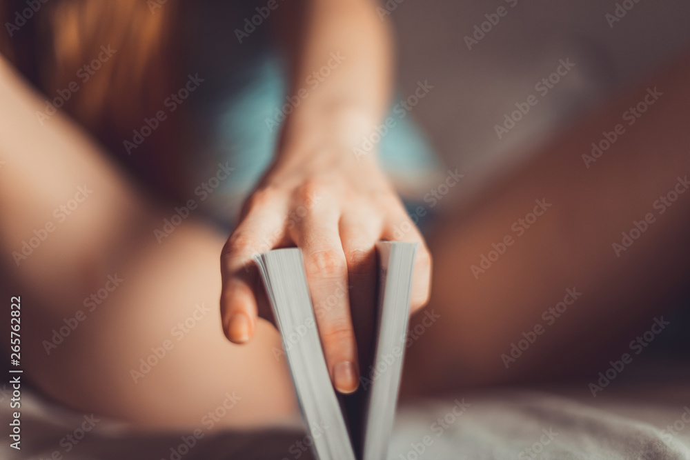 Vagina symbol. Two fingers on book on bed. Woman read love novel. Sex  concept. Womens secrets. Reading is sexy Stock Photo | Adobe Stock