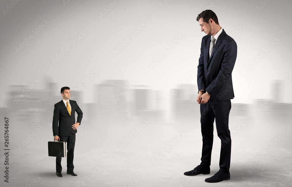 Giant businessman being afraid of small serious executor with suitcase
Giant businessman being afraid of small serious executor with suitcase