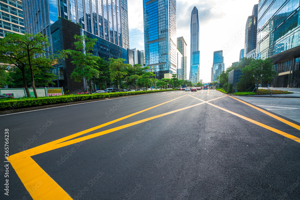 highway transportation and the high-rise building under the blue sky.