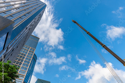 Window glass, Modern architecture in the blue sky white cloud city photo