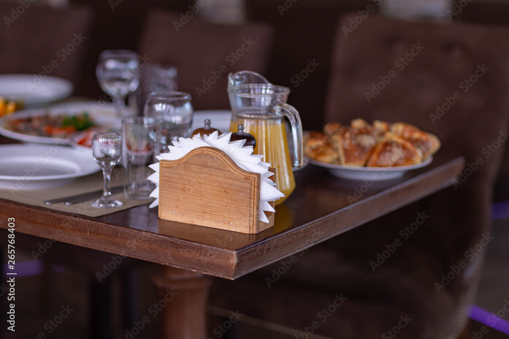 wedding table setting in the restaurant,shot in natural light wedding table setting in the restaurant,shot in natural light