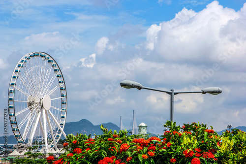 Canvas Print City under the blue sky white cloud ferris wheel