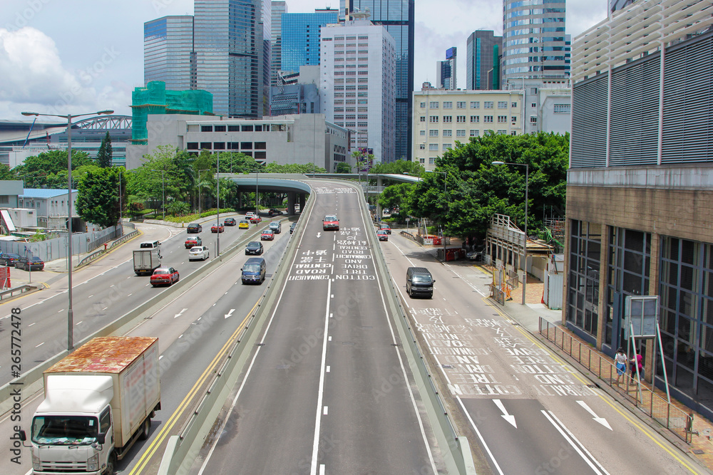 Hong Kong's road traffic and modern buildings.