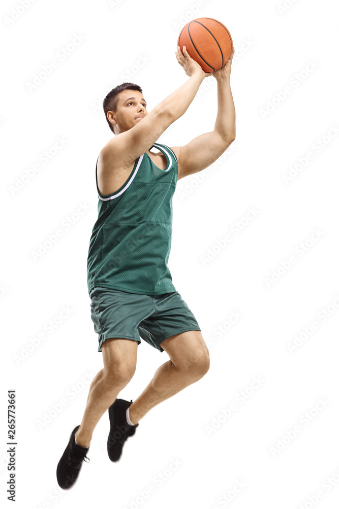 Male basketball player shooting a ball