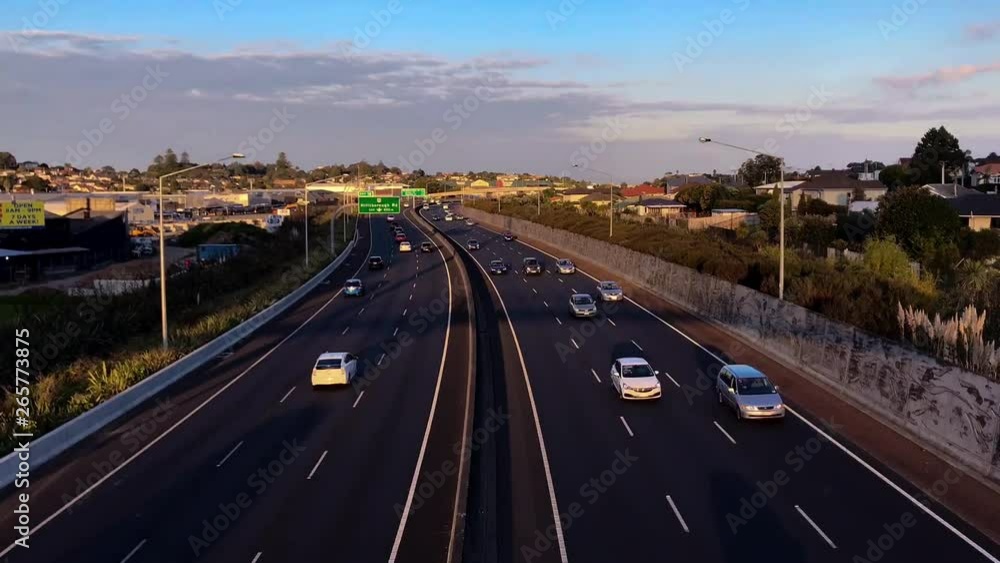 Time lapse of motorway traffic during golden hour in Auckland New Zealand Time lapse of motorway traffic during golden hour in Auckland New Zealand