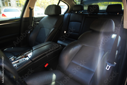 Nice luxury leather interior of passenger car from inside © ALYEVA