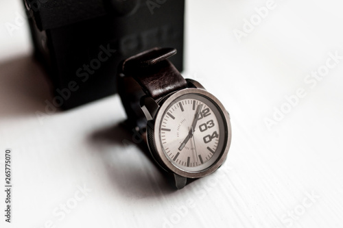 men's watch on a light background. Accessories for a businessman