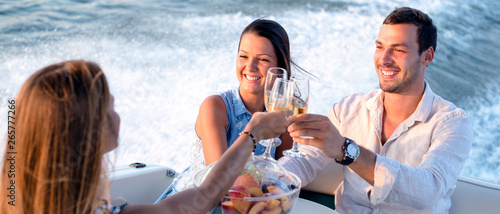 Girl is having drink on a boat