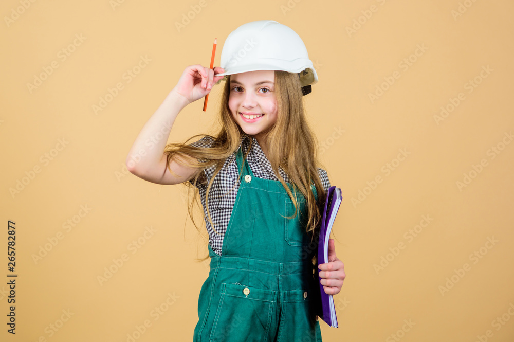 small girl repairing in workshop. Foreman inspector. Repair. Child care development. Safety expert. Future profession. Builder engineer architect. Kid worker in hard hat. This is my place. small girl repairing in workshop. Foreman inspector. Repair. Child care development. Safety expert. Future profession. Builder engineer architect. Kid worker in hard hat. This is my place.