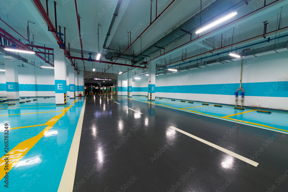 Fototapeta premium Underground parking and ceiling piping systems.