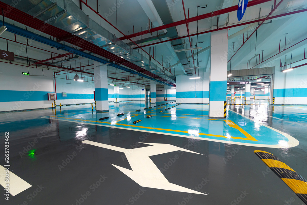 Fototapeta premium Underground parking and ceiling piping systems.