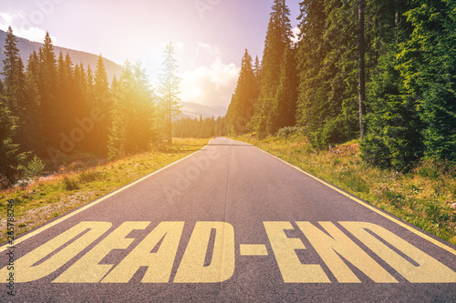 Dead-end written on road in the mountains. Dead-end text on the road. photo
