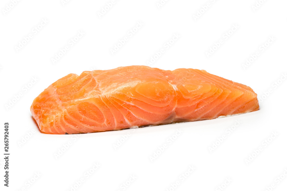 A large pink salmon fillet isolated on a white background