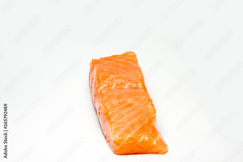 A large pink salmon fillet isolated on a white background A large pink salmon fillet isolated on a white background