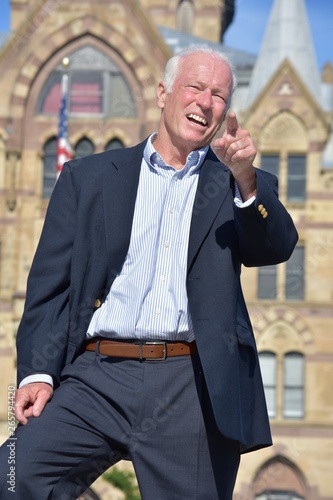 Fotografie Adult Senior Political Candidate Talking Wearing Business Suit