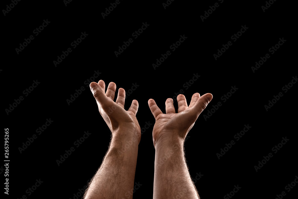 Man's hands closeup prayer isolated on black background Man's hands closeup prayer isolated on black background