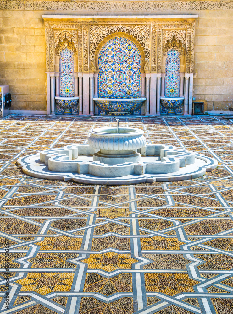Amazing moroccan style fountain with fine colorful mosaic tiles at the Mohammed V mausoleum in Rabat Morocco. Artistic picture. Beauty world.
