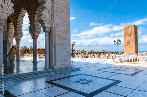 RABAT, MOROCCO - MARCH 20, 2018: Beautiful Mausoleum of Mohammed V and square with Hassan tower in Rabat on sunny day. March 20, 2018 in Rabat, Morocco