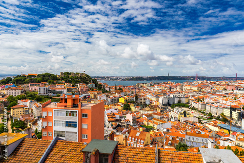 Lisbon, Portugal skyline with Sao Jorge Castle. Panoramic aerial view of Lisbon, Portugal. Panorama view of old town Lisbon and Sao Jorge Castle, the capital and the largest city of Portugal.