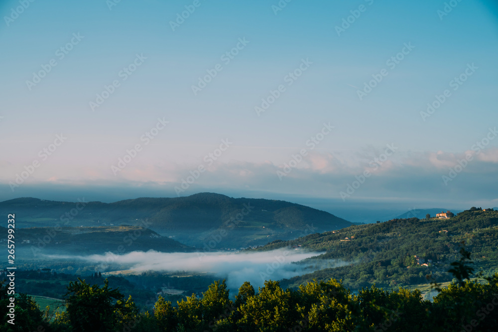 Beautiful foggy landscape in Tuscany, Italy.