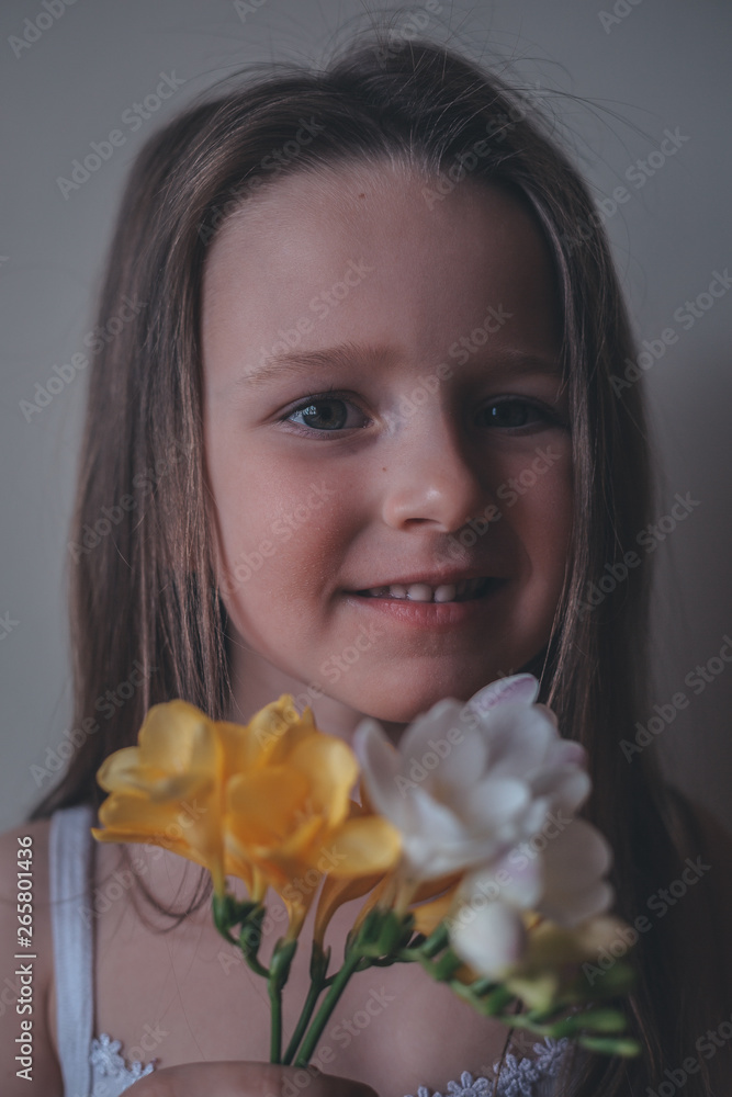 portrait of young woman with flowers