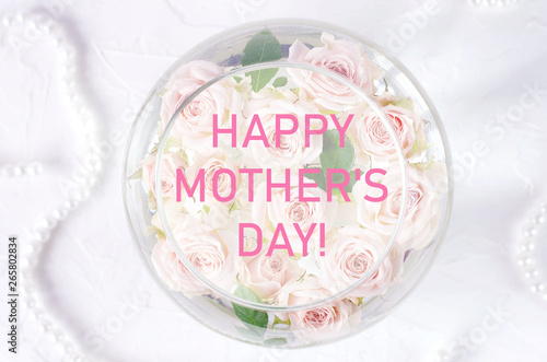 Greeting card with mother's day greetings and small roses.