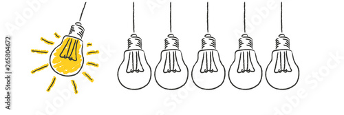 light bulb drawn on whiteboard concept idea photo