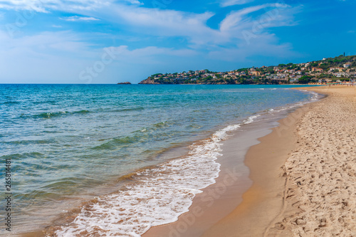 Fototapeta Naklejka Na Ścianę i Meble -  Beach and sea landscape with Sperlonga, Lazio, Italy. Scenic resort town village with nice sand beach and clear blue water in picturesque bay. Famous tourist destination in Riviera de Ulisse