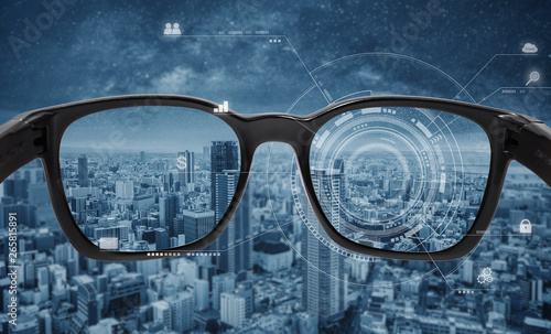 Smart glasses, VR virtual reality, and AR augmented reality technology. Smart glasses with futuristic technology graphics and modern city background