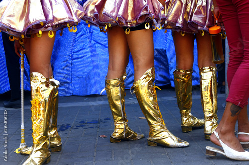 Colorful costumes, attire and props of parade participants