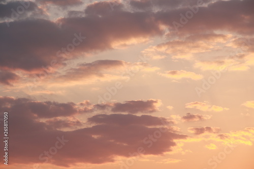 Golden cumulus sunset clouds background © Iveta
