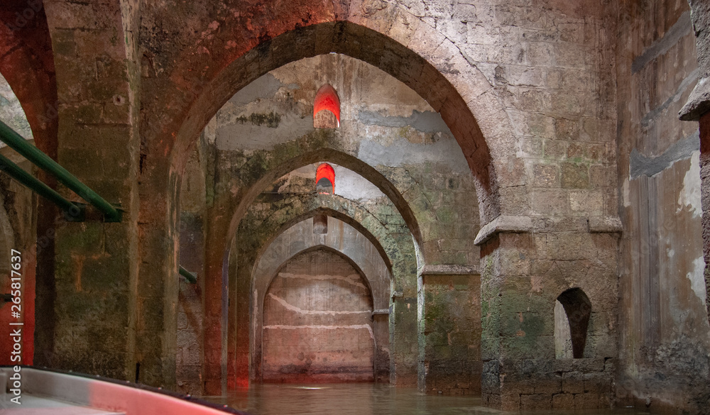 The underground Pool of Arches in Ramla.Israel. Built during the reign of the caliph Haroun al-Rashid in 789 AD