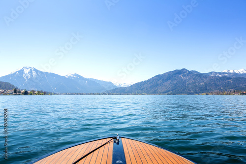 From bow of boat, a look of Tegernsee and mountains in Bayern, Germany photo