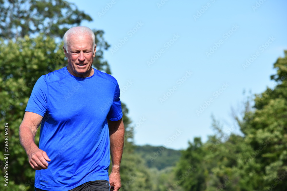 Fototapeta premium Senior Male Walking Outside