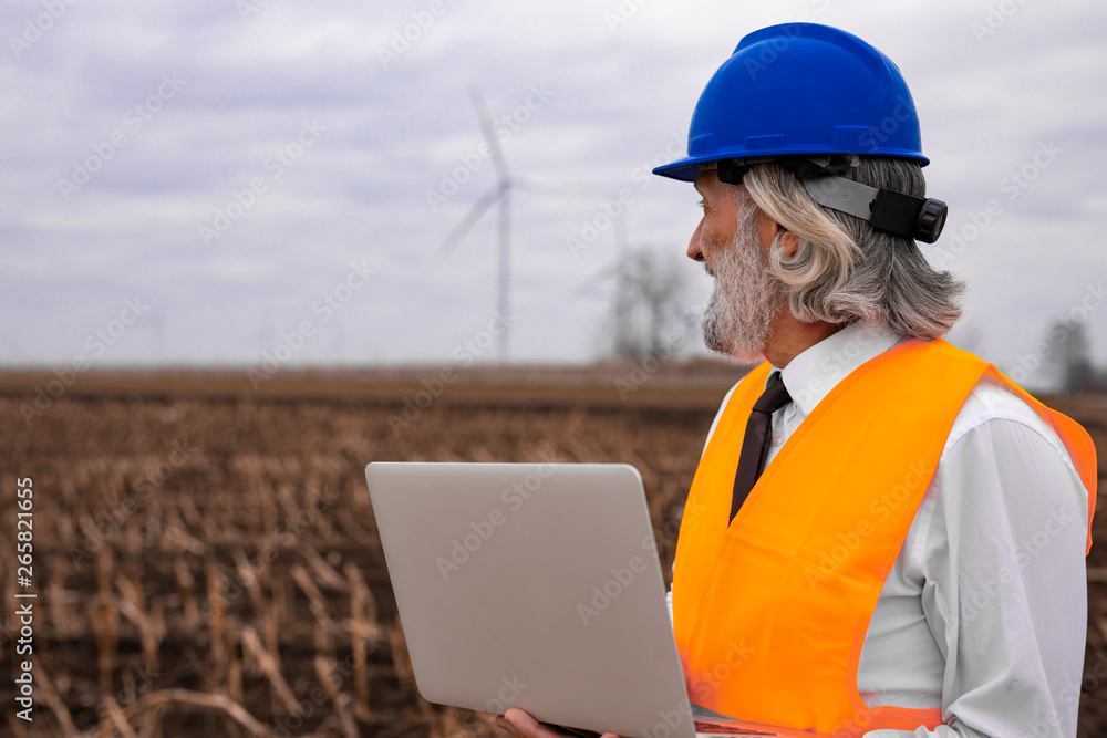 Senior engineer is working on the wind turbine field Senior engineer is working on the wind turbine field