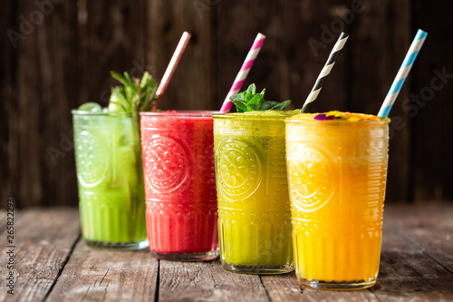 Tasty smoothies served on the rustic wooden table