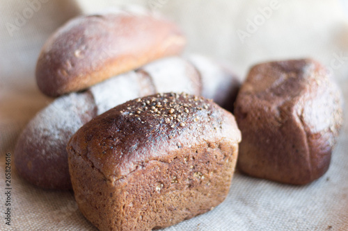 rye bread in assortment,several types of bread on a gray background