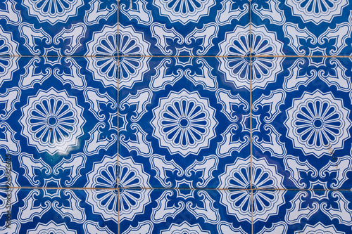 Azulejo is a form of Portuguese or Spanish painted, tin-glazed, ceramic tile work. Azulejos is traditional Portugese tiles in Aveiro. Architecture ornament. Aveiro, Portugal.