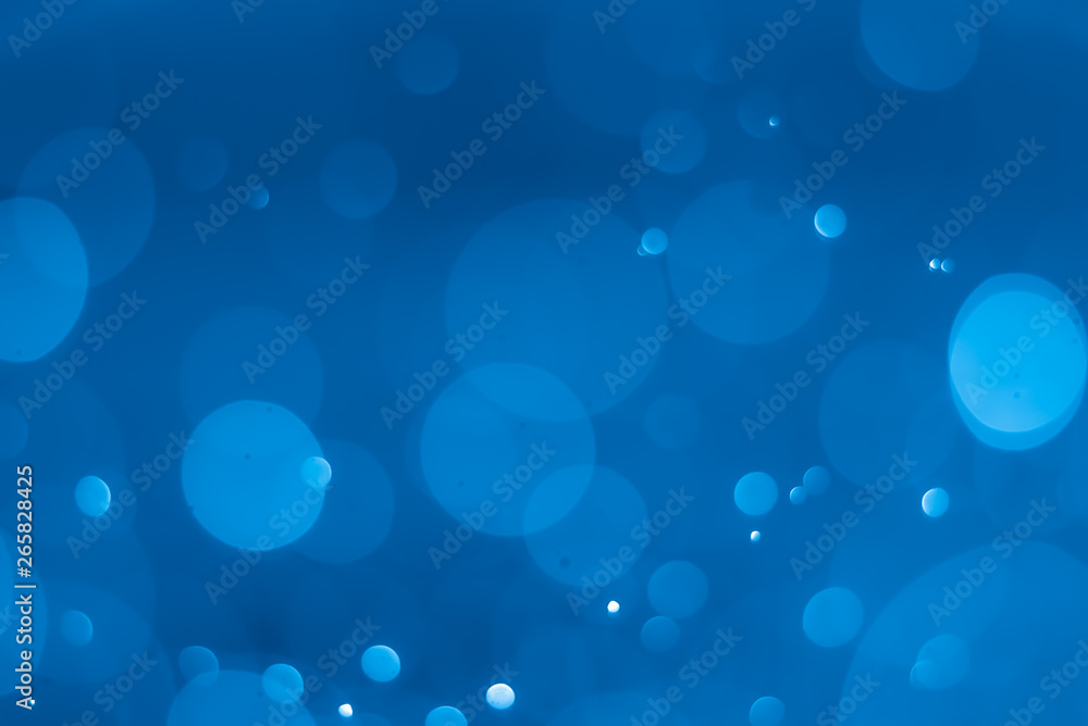 abstract soft bokeh light effect with glow blue background