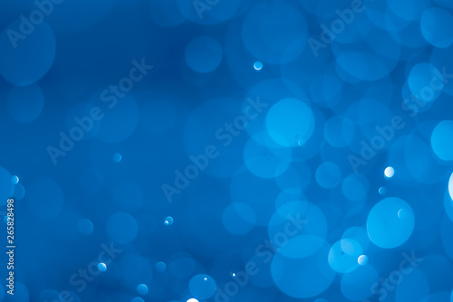 abstract soft bokeh light effect with glow blue background