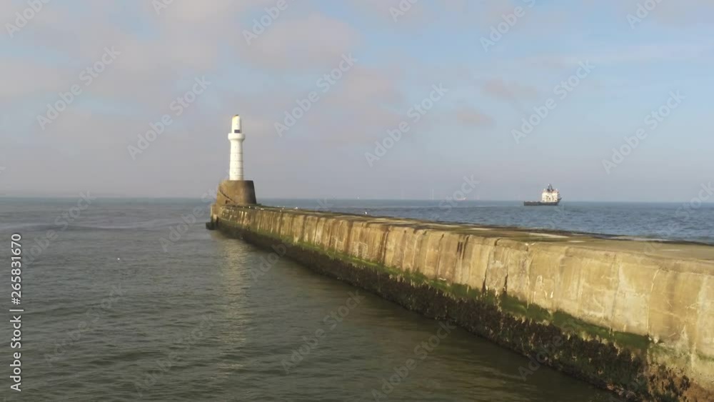 Aberdeen Lighthouse in front of Blue Sky and Clouds Aberdeen Lighthouse in front of Blue Sky and Clouds