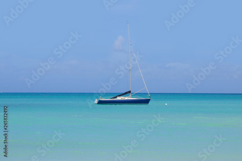 A sailboat in the Caribbean Sea. Summer Dreams. Beach - Antigua