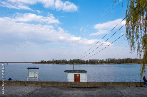 Kyiv region , Ukraine - April 21, 2019: Quay of the Dnipro river in the city of Ukrainka, Kiev region, Ukraine photo