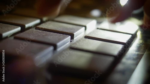 beat producer playing music on modern drum pad in home studio