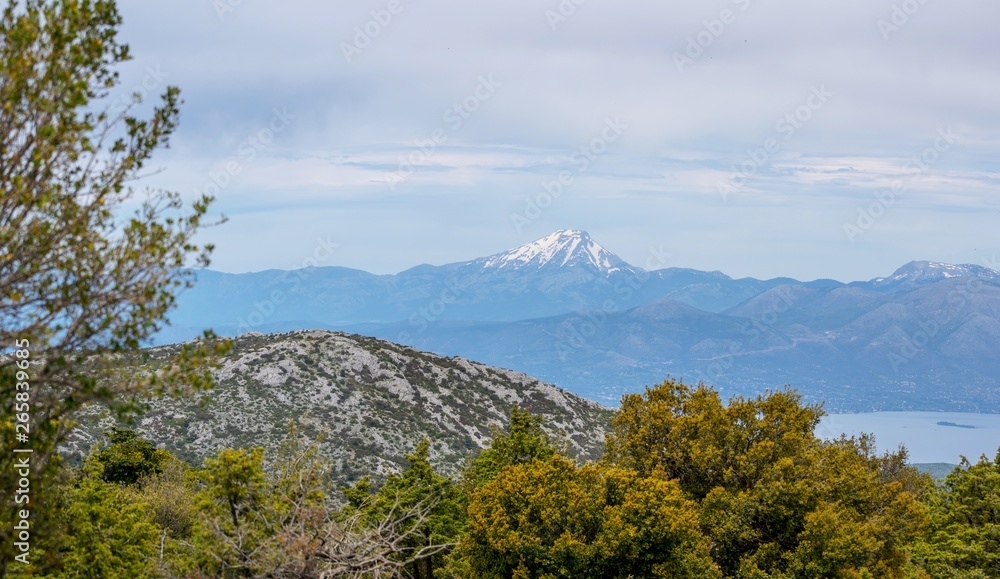 Beautiful panoramic photo of the mountain Dirfis at Euboia with snow on it's peak.